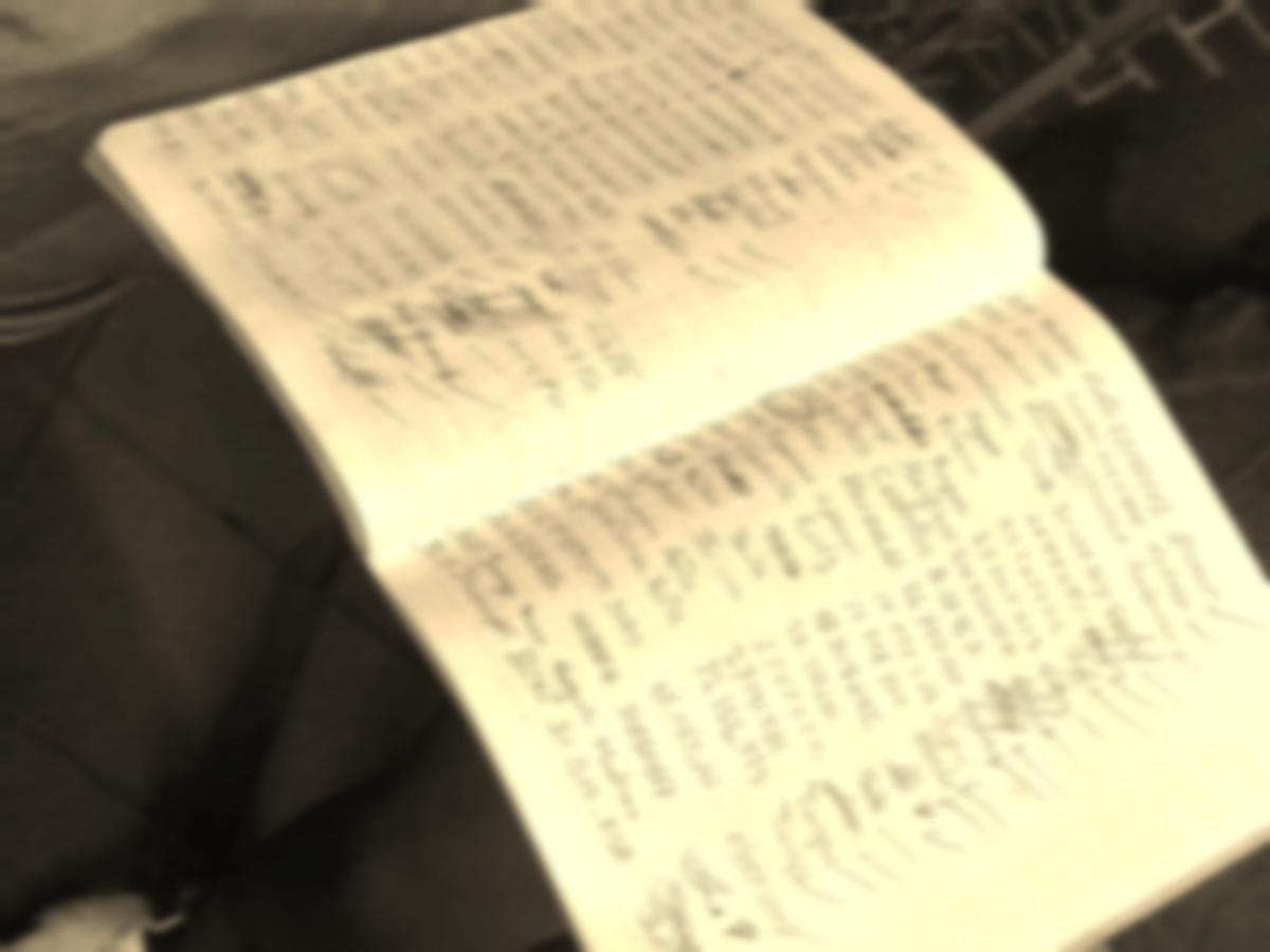 a woman shaking hands with another woman sitting at a table